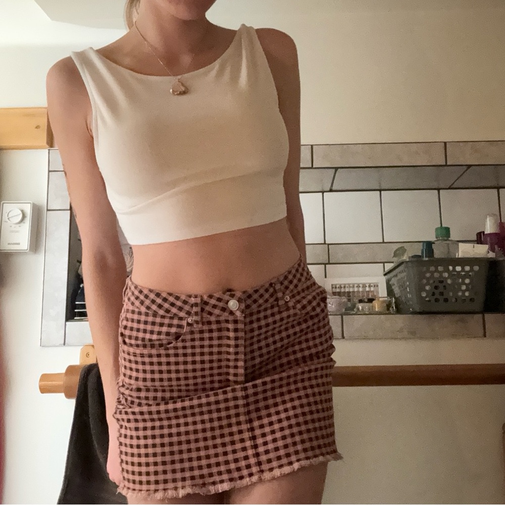 pink and black patterned skirt